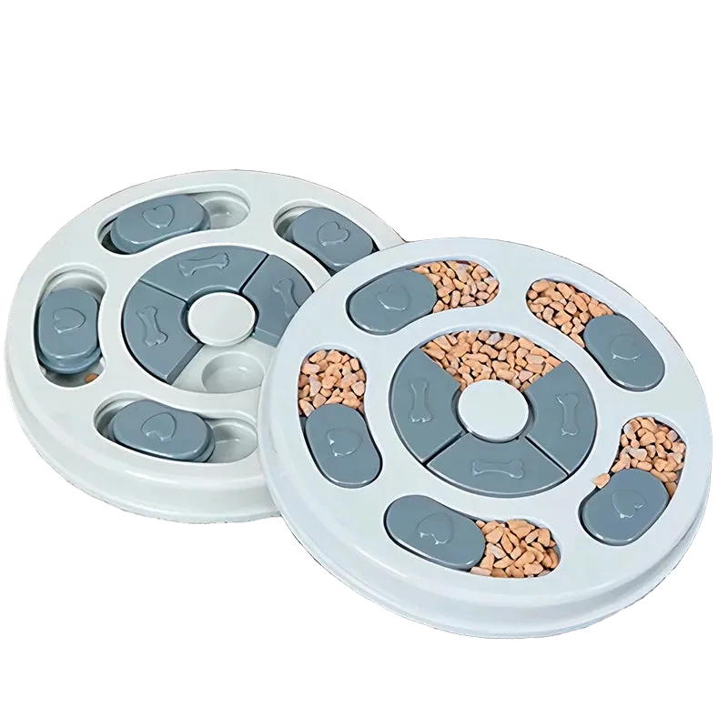 Two round puzzle feeders filled with kibble