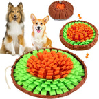 Orange and green snuffle bowl mat with two dogs