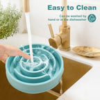 Rinsing the maze bowl under a kitchen faucet
