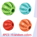 Four rubber treat balls in random colors
